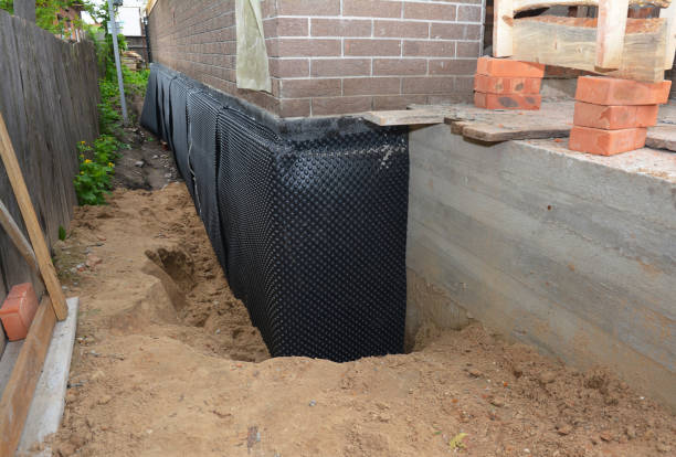 SJ Waterproofing Pros technician performing targeted Interior Drainage System assessment in Bon Air, AL